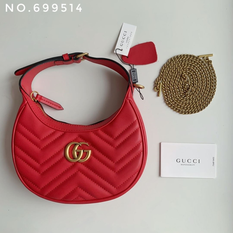 G*u*i top handle bags